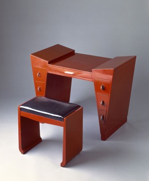 Dressing Table and Bench, c. 1929. After Léon Jallot (French, 1874–1967).
Lord & Taylor (American, New York, est. 1826), retailer. Lacquered joined wood, mirror glass, metal; table:
79.3 x 105.4 x 60.3 cm; bench: 49.5 x 54.8 x 31.5 cm.
Cooper Hewitt, Smithsonian Design Museum, Gift of James M. Osborn, 1969-97-7a/i. Dressing Table and Bench, c. 1929. After Léon Jallot