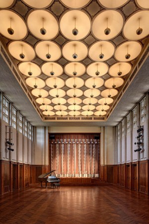 Auditorium of Kingswood School for Girls (now Cranbrook Kingswood Upper School), with ceiling designed by Eero Saarinen and curtain by Pipsan Saarinen Swanson. Completed in 1931. Photography by James Haefner, Courtesy Cranbrook Center for Collections and Research. Kingswood School for Girls Auditorium